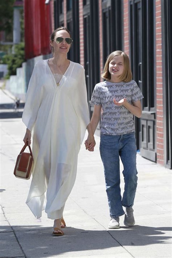 Angelina Jolie Looks Gorgeous In Flowing White Dress While On Shopping Trip With Vivienne, 10, -– Pics