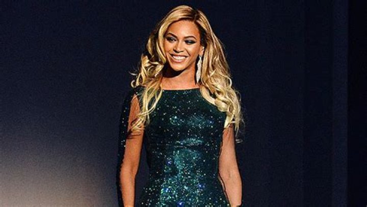 Beyoncé Stuns In Satin Green Dress With Plunging Black Top In Sexy New Photos