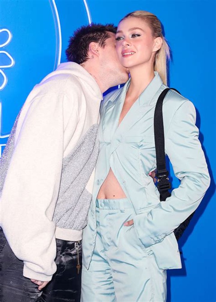 Brooklyn Beckham Kisses Nicola Peltz’s Neck On The Red Carpet At Dior Men’s Show: Photos