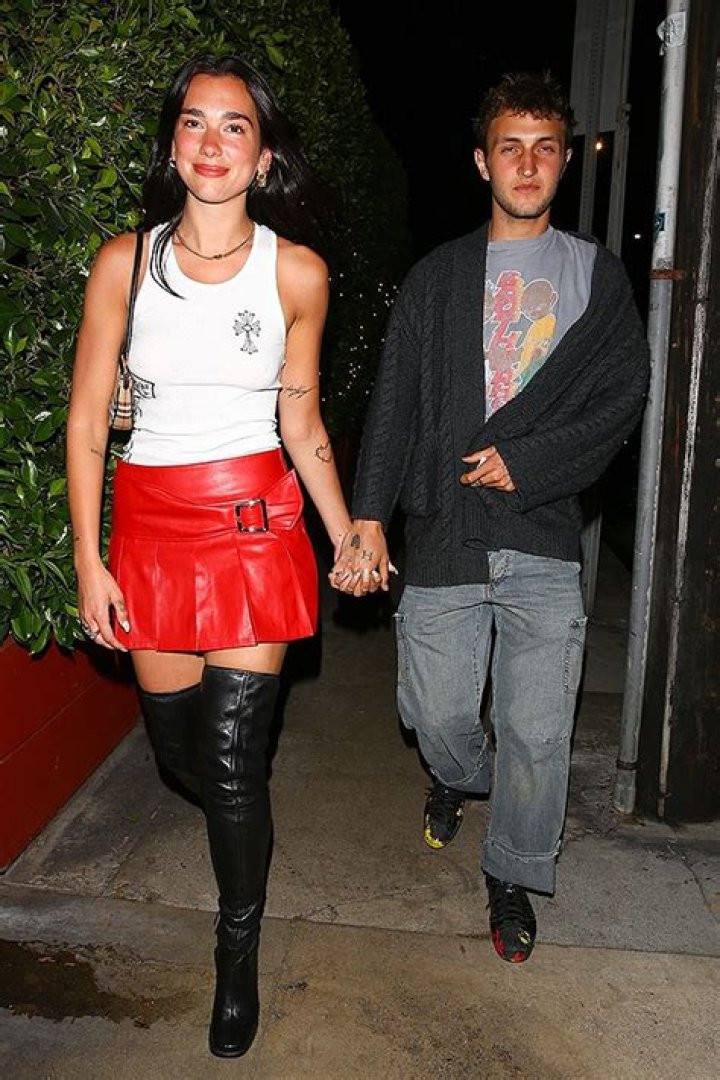 Dua Lipa & Anwar Hadid Spotted Holding Hands As She Rocks Red Skirt – Hollywood Life