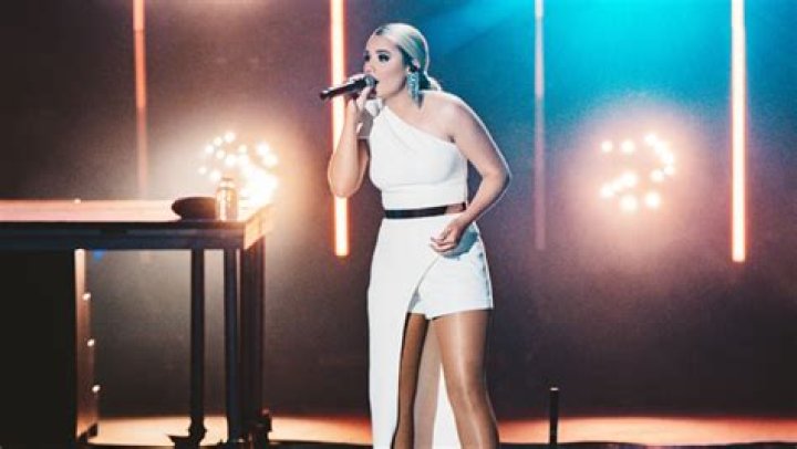 Gabby Barrett Stuns In White Shorts For CMA Summer Jam With Hubby Cade Foehner