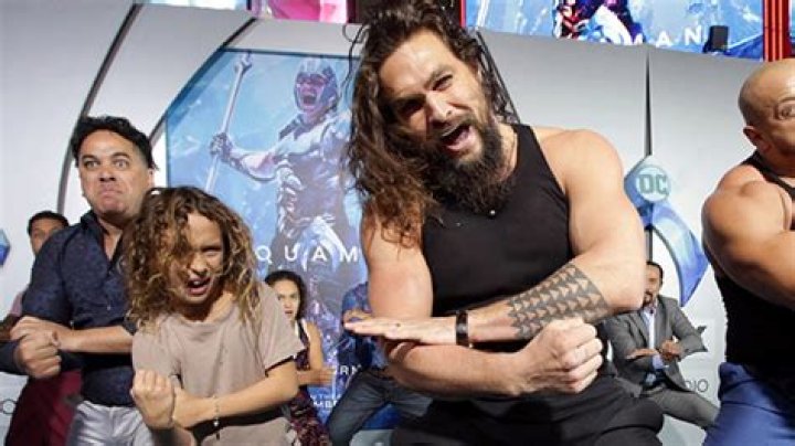 Jason Mamoa Teaches Son, 11, To Throw Tomahawks While Shirtless & His Aim Isn’t Exactly True