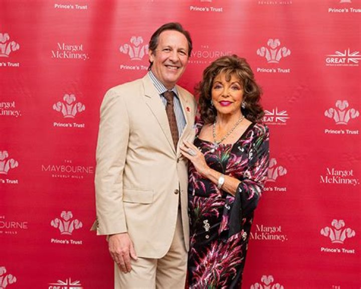 Joan Collins, 90, Looks Fabulous in Gorgeous Floral Dress With Pierce Brosnan at Prince’s Trust Lunch