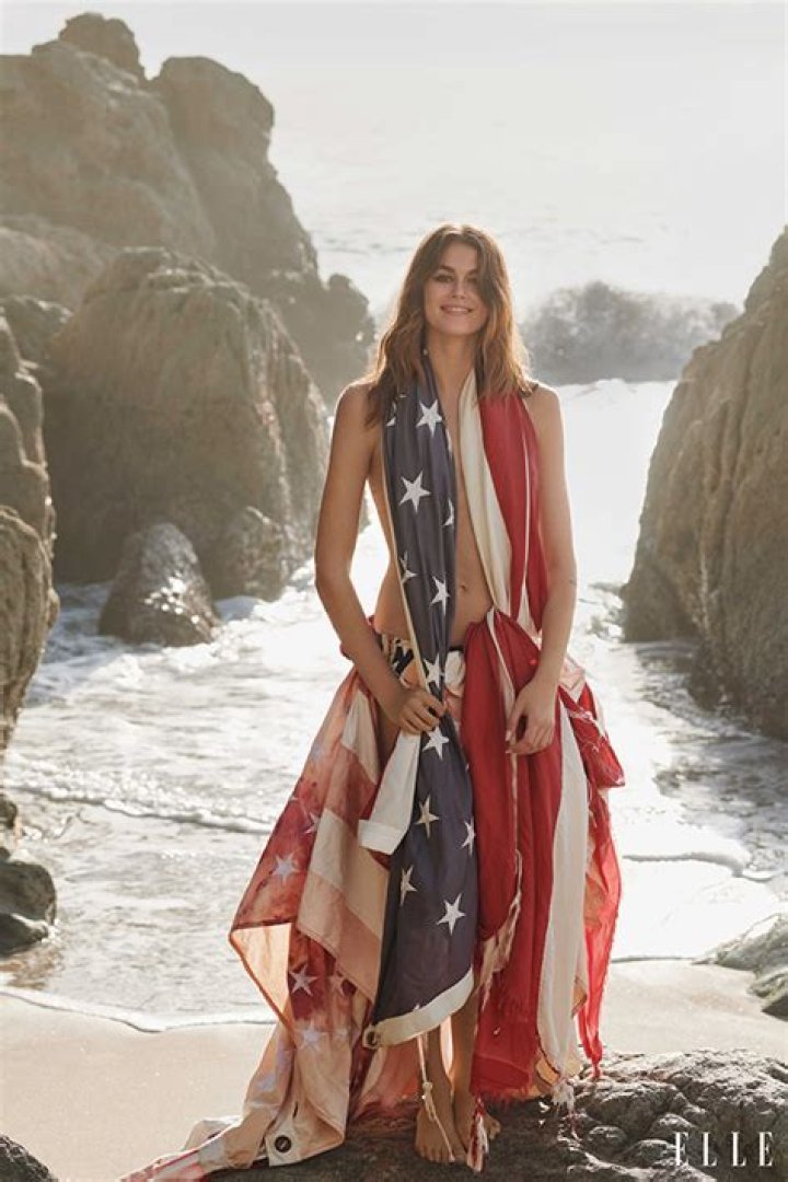 Kaia Gerber Rocks Nothing But An American Flag For Sexy ‘Elle’ Cover Shoot: Photos