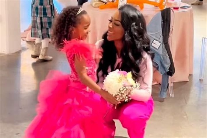 Kenya Moore’s Daughter Brooklyn, 1, Hides Under Her Mommy’s Dress In Sweet New Video