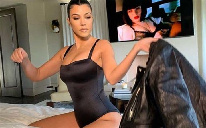 Kourtney Kardashian, 40, Shows Off Toned Legs In Sexy Skims Bodysuit & Leather Jacket  