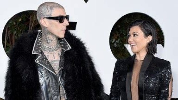 Kourtney Kardashian & Travis Barker Kick Each Other’s Butts Backstage at Blink-182 Show: Watch