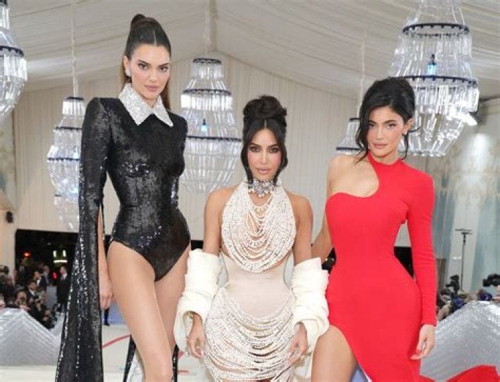 Kylie Jenner & Kim Kardashian Show Up In The Same Red Corset To Dinner: This Was ‘Not Planned’