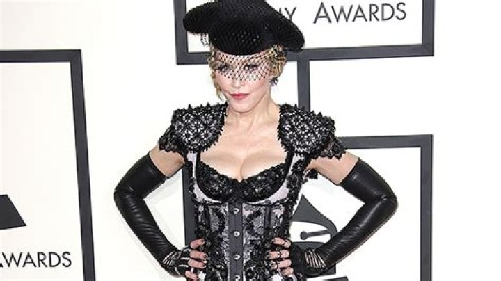 Madonna Pairs Corset Top & Shorts With Fishnets For Sexy New Photos