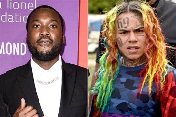 Meek Mill & Tekashi 6ix9ine Have To Be Separated By Security After Rappers Face Off In Club Parking Lot – Watch