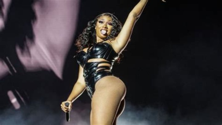 Megan Thee Stallion Stuns In Cutout Rainbow Jumpsuit To Show Off Her ‘Natural’ Figure: Watch