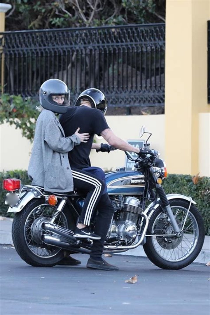 Miley Cyrus Catches A Ride On The Back Of Cody Simpson’s Motorcycle After Lunch Date — Pics