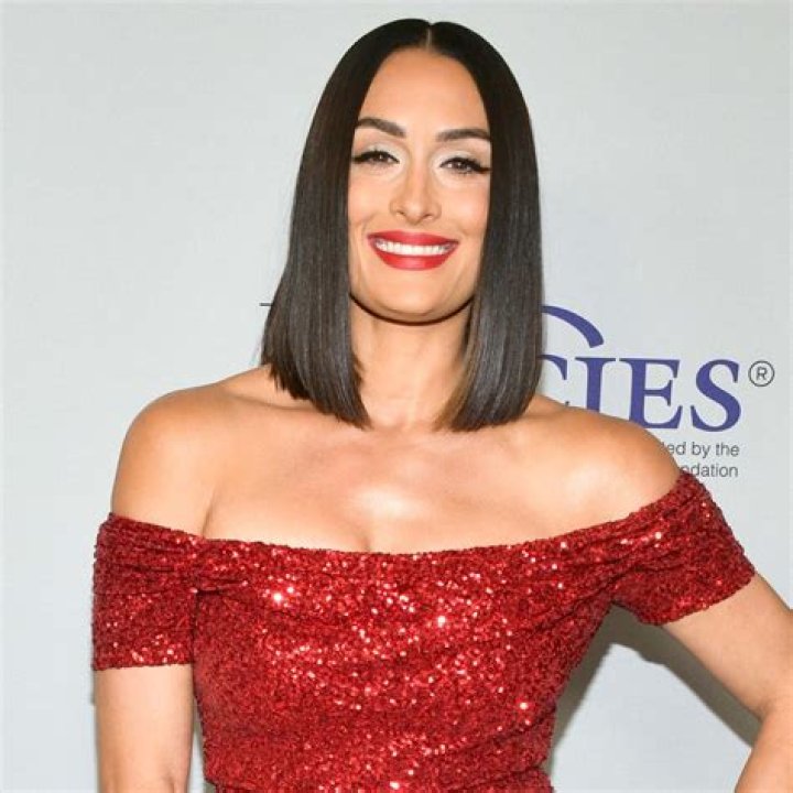 Nikki Bella Stuns In Makeup-Free Photo While Celebrating Her Quarantine ‘Flaws’ Like Gray Hair & More