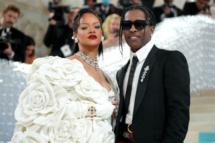 Rihanna Teases A$AP Rocky About His First Ever Red Carpet Outfit & Buying Condoms In Cute Q&A